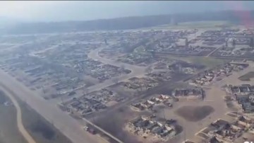 Aerial view of devastated Fort McMurray. Not a house standing for blocks around (Credit: Global News)