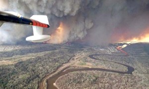 The fire out of control (Credit: Canadian Press)