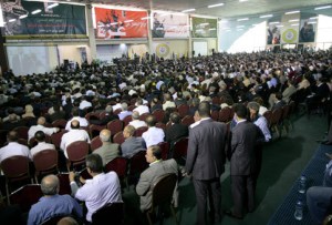 Thousands of Fatah delegates from around the world seated inside the conference hall. (Credit: Haytham Othman/MaanImages)