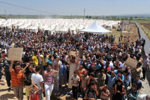 Syrian refugees demonstrate at a 2015 Jordanian camp. (Credit: World Bank)